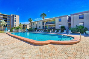 Relax by the pool surrounded by comfortable lounge chairs and take a refreshing dip in the clear water.
