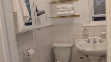 Hair dryer, towels, soap, toilet paper