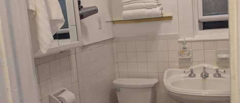 Hair dryer, towels, soap, toilet paper