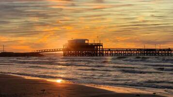 On the beach, sun loungers, beach towels