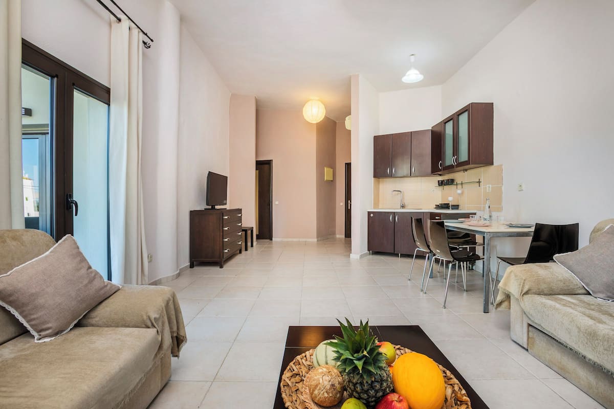 Family Suite | Living area | 32-inch LED TV with digital channels