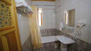 Hair dryer, slippers, towels, soap