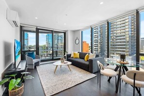 TV, offices - Brand New 2BR Oasis Retreat w/ Parking, Pool & Gym (South Melbourne)