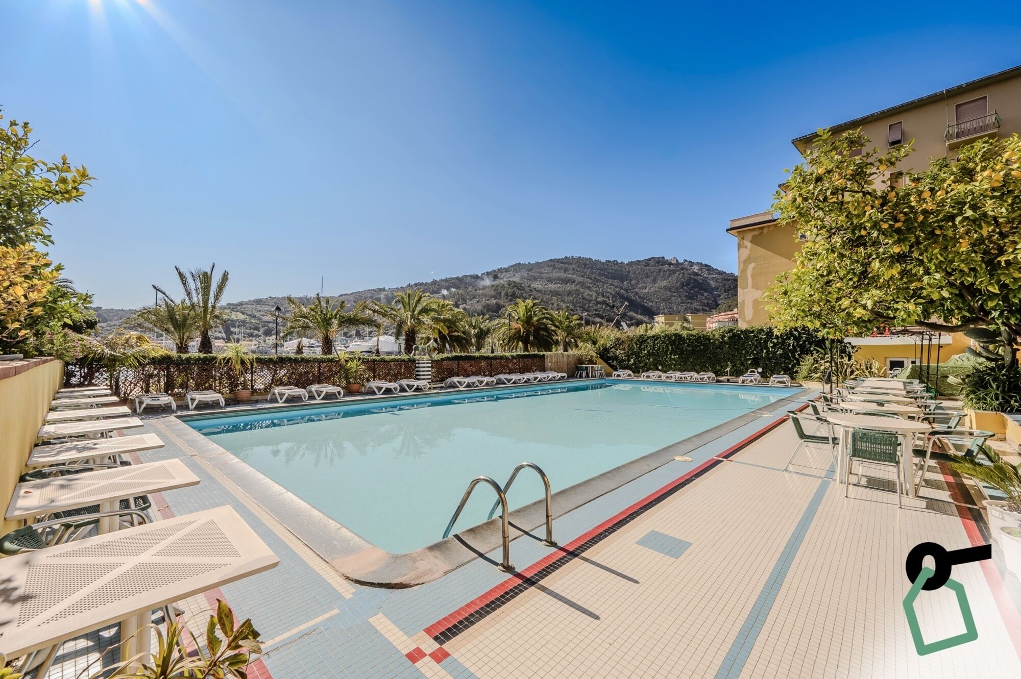Seasonal outdoor pool, open 9:00 AM to 7:00 PM, pool umbrellas
