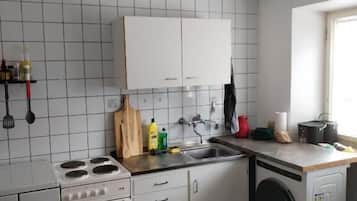 Fridge, stovetop, cookware/dishes/utensils