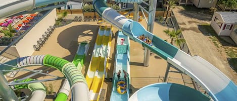 A water park with multiple slides and pools.