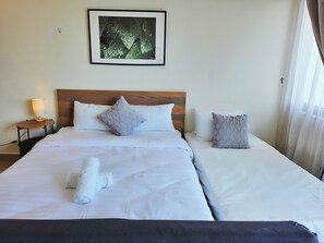 1 habitación, tabla de planchar con plancha, wifi y ropa de cama 