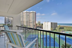 Enjoy a view of the tennis court from the comfort of your balcony.
