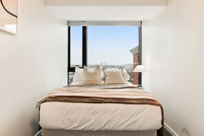 2 dormitorios, tabla de planchar con plancha, wifi gratis y ropa de cama