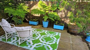 Estúdio, 1 quarto, varanda, vista para o jardim | Área de estar