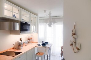 Microwave, stovetop, coffee/tea maker, toaster