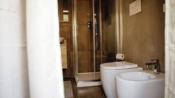 Hair dryer, towels, soap, toilet paper