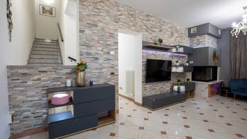 House | Living area | 32-inch TV with cable channels