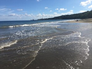 Beach nearby, black sand, 2 beach bars