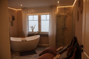 Jetted bath, hair dryer, towels, soap