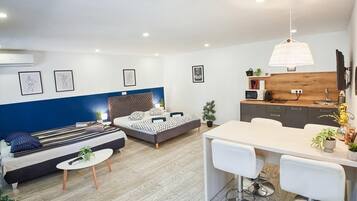 1 chambre, fer et planche Ă repasser, Wi-Fi, draps fournis