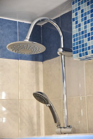 A shower with a handheld spray head and a fixed overhead showerhead. - Athens Ianos B by Super Host Hub (Athens)