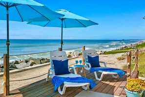 On the beach, sun-loungers, beach towels