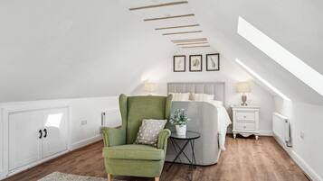 1 bedroom, desk, iron/ironing board, travel crib