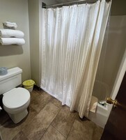 Standard Room, 2 Queen Beds, Mountain View | Bathroom | Towels, soap, shampoo, toilet paper