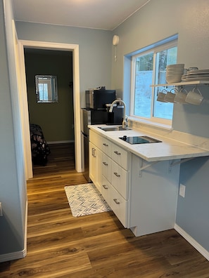 Fridge, microwave, stovetop, coffee/tea maker