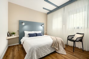 1 dormitorio, cuna de viaje, wifi gratis y ropa de cama