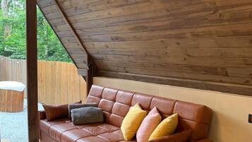 Romantic Chalet, 1 Double Bed with Sofa bed, Jetted Tub, Courtyard Area | Living area | 32-inch Smart TV with digital channels, Netflix, streaming services