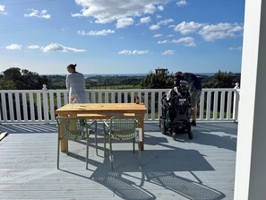 Outdoor dining - Accessible Ohope Beach Country Cottage (Wainui)