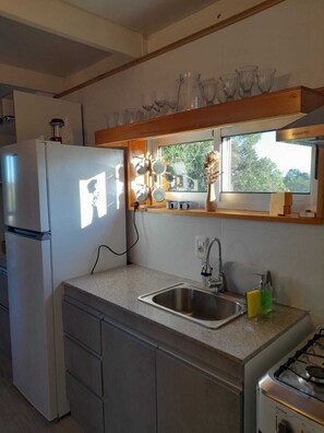 Een magnetron, een oven, een kookplaat