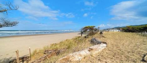 On the beach, sun loungers, beach towels