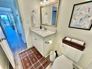 Eco-friendly toiletries, hair dryer, towels