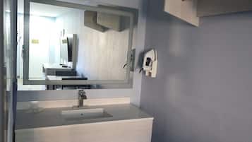 Room, 1 King Bed, Non Smoking | Bathroom | Towels, soap, toilet paper