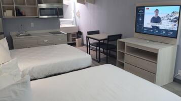 Room, 2 Double Beds, Non Smoking | In-room safe, blackout drapes, cribs/infant beds, rollaway beds