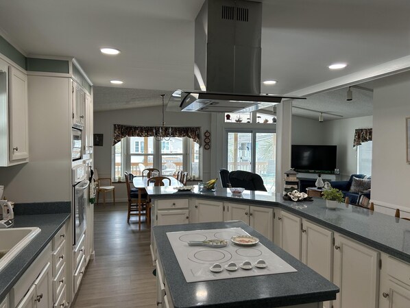 Fridge, microwave, oven, stovetop - Three Bedroom Waterfront Beach House in Oceanside Village (Surfside Beach)