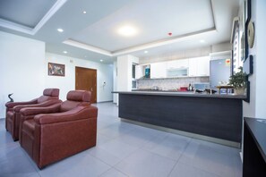 Apartment, City View | Private kitchen | Full-size fridge, microwave, oven, cookware/dishes/utensils