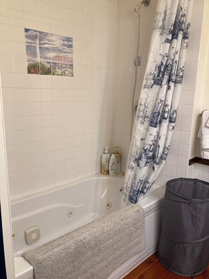 Jetted tub, hair dryer, towels, soap