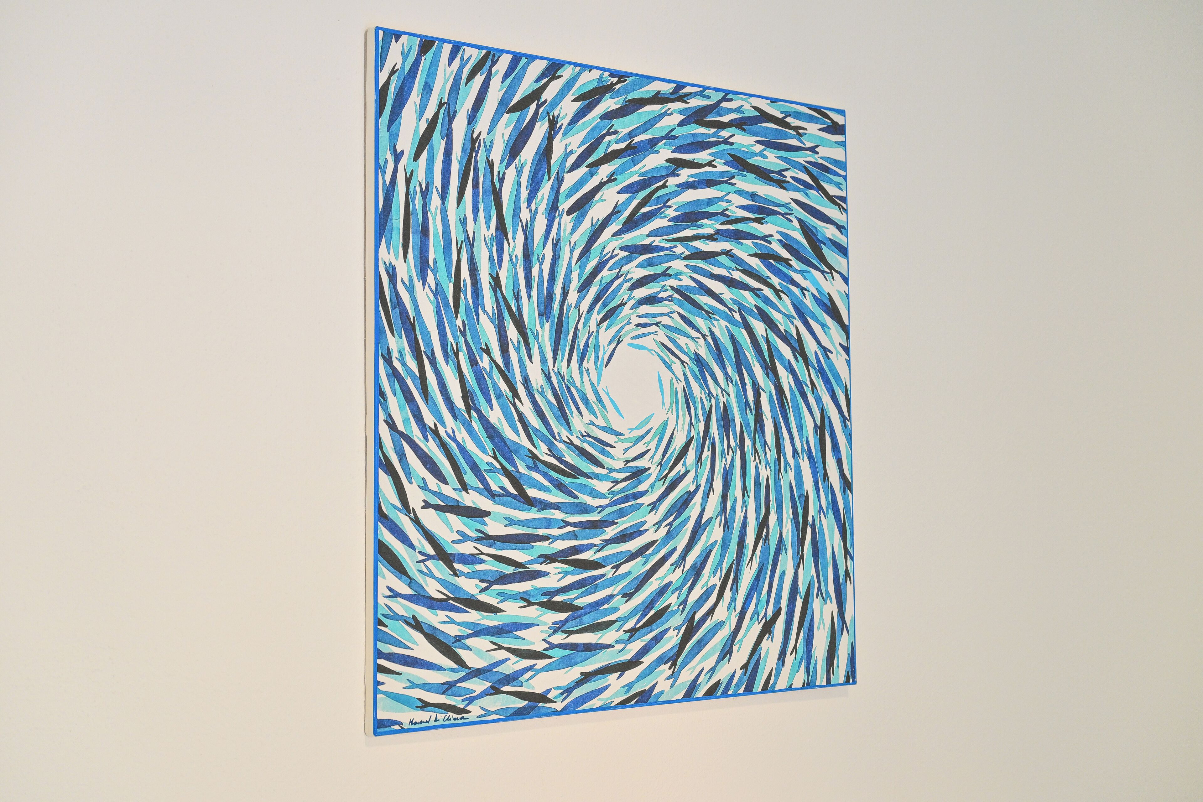 Uma pintura com um padrão espiralado.
