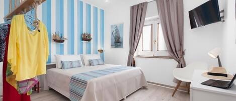 1 chambre, fer et planche Ă repasser, Wi-Fi gratuit, draps fournis