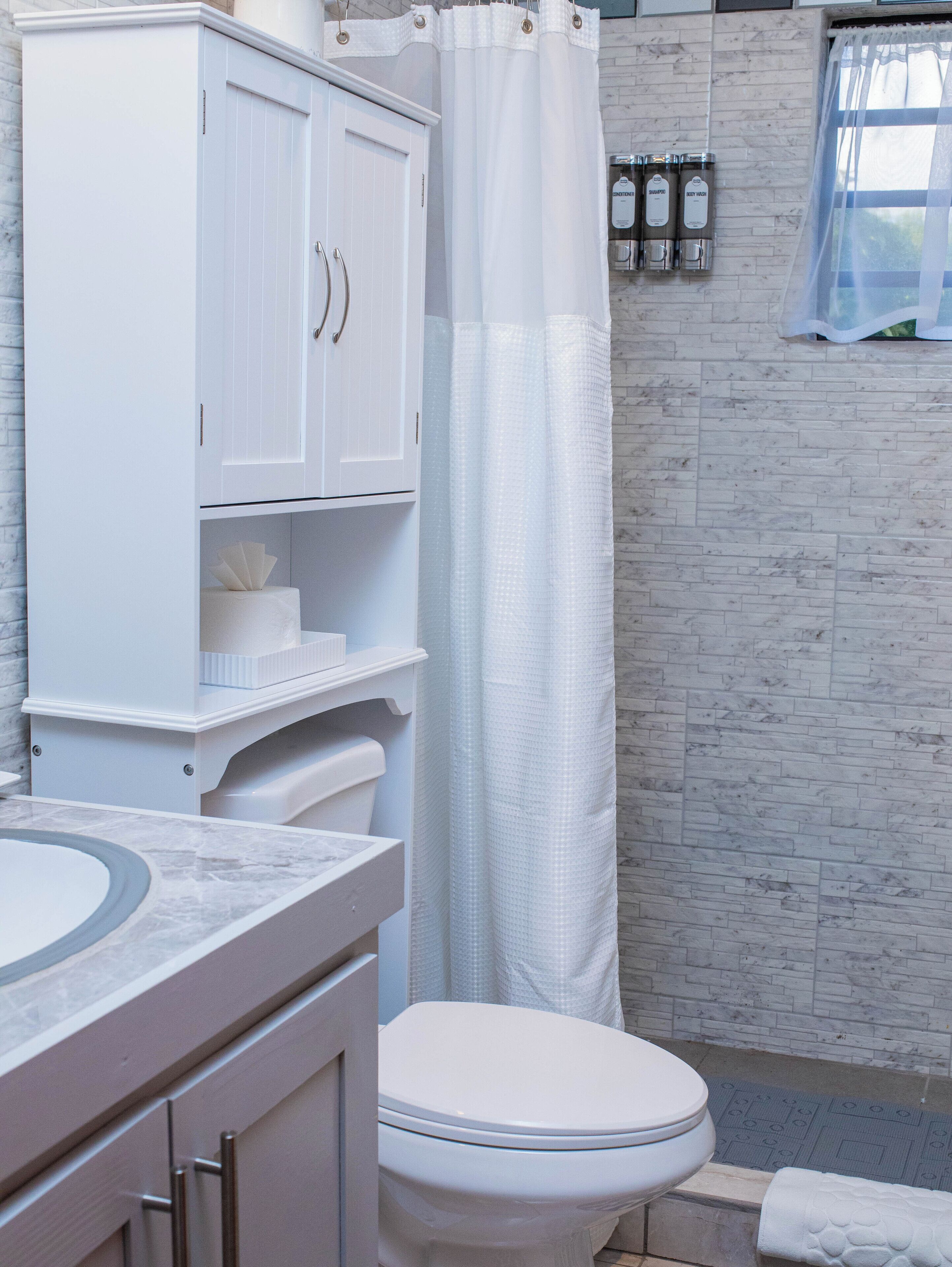 Shower, towels, soap, toilet paper