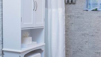 Shower, towels, soap, toilet paper
