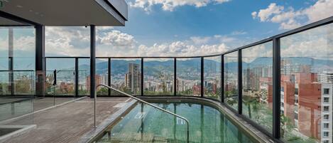 Outdoor pool, open 8:00 AM to 8:00 PM, sun loungers