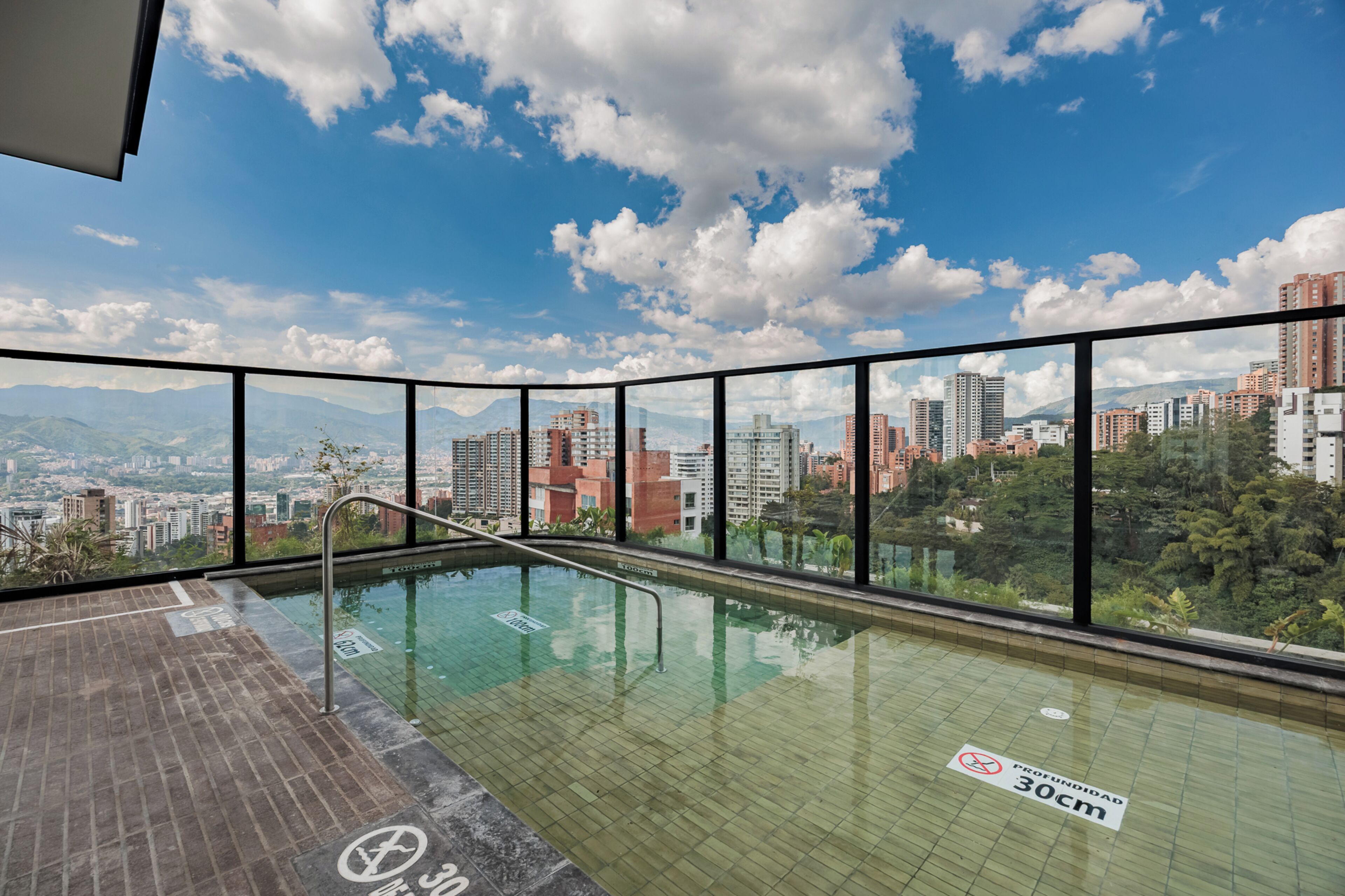 Outdoor pool, open 8:00 AM to 8:00 PM, sun loungers