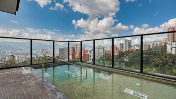 Outdoor pool, open 8:00 AM to 8:00 PM, sun loungers