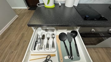 Fridge, microwave, stovetop, cookware/dishes/utensils