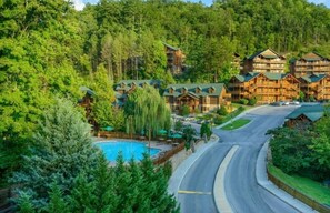 Indoor pool, 2 outdoor pools, open 9:00 AM to 11:00 PM, pool umbrellas