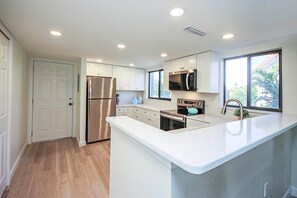 Fridge, microwave, oven, stovetop - Stunning 2nd story beachfront condo on Sanibel Island - Sandalfoot 2D2 (Sanibel Island)