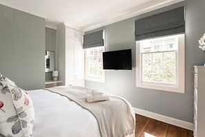 2 عدّة غرف نوم ومكواة/لوح كي وواي فاي مجانًا وملاءات أسرّة