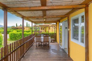 Outdoor dining - Bungalow 'Sole2' with Shared Pool, Private Terrace and Air Conditioning (Bibbona)