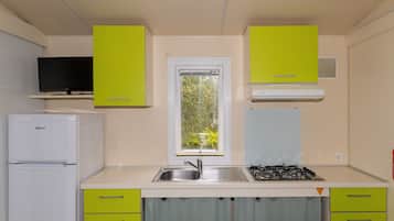 Fridge, stovetop, highchair, cookware/dishes/utensils