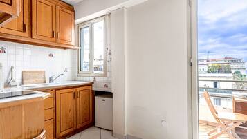 Fridge, microwave, cookware/dishes/utensils